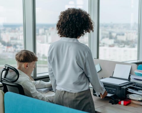 Photo by Mikhail Nilov: https://www.pexels.com/photo/people-working-in-the-office-8297569/